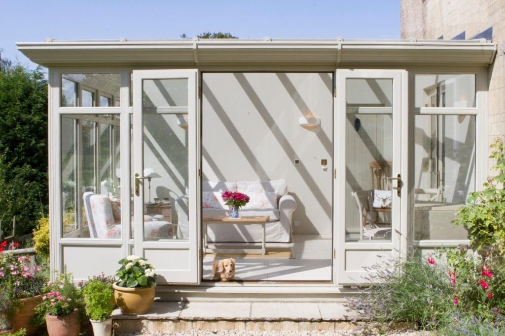 White timber framed lean-to conservatory