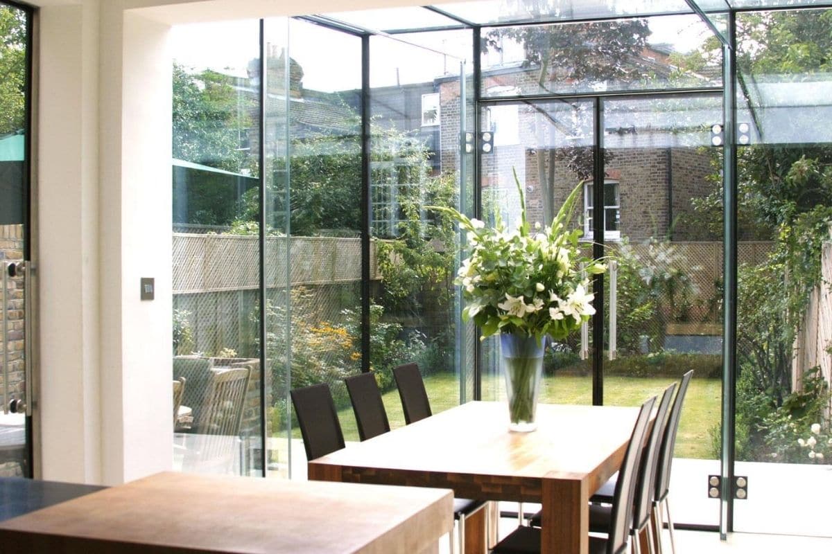 Glass box extension extending the dinning and entertaining area of the home