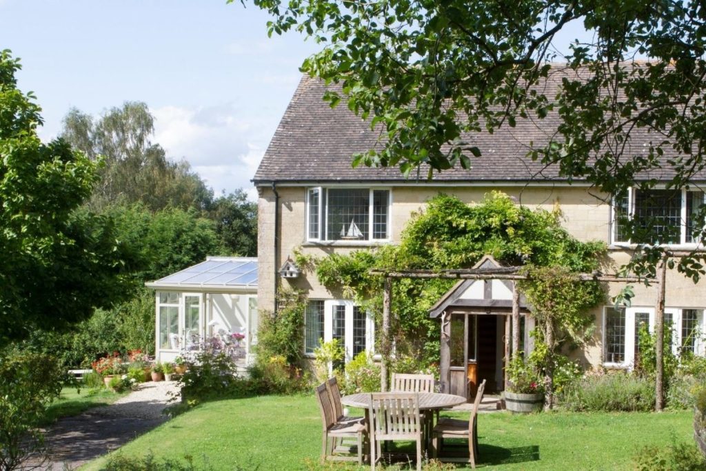 White timber framed lean-to conservatory