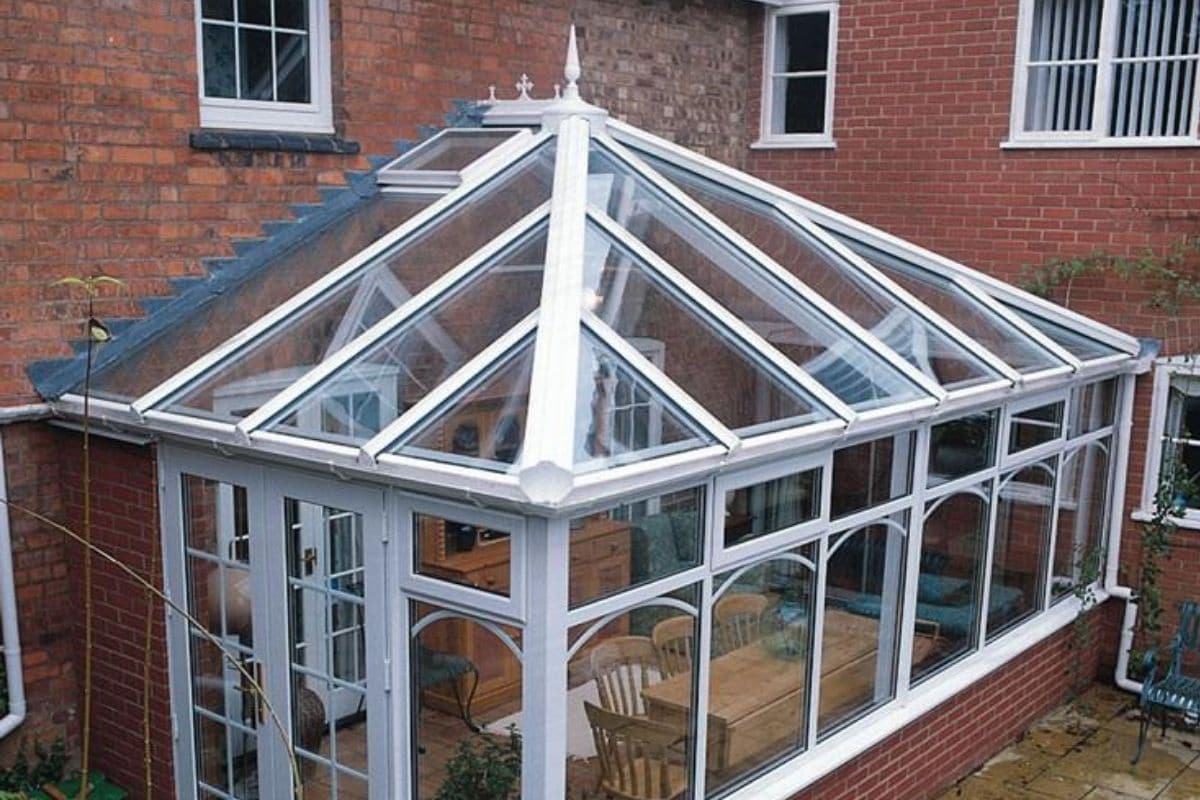 Traditional uPVC conservatory in a white finish and roof finials