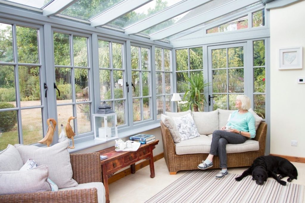 Inside of white timber framed lean-to conservatory