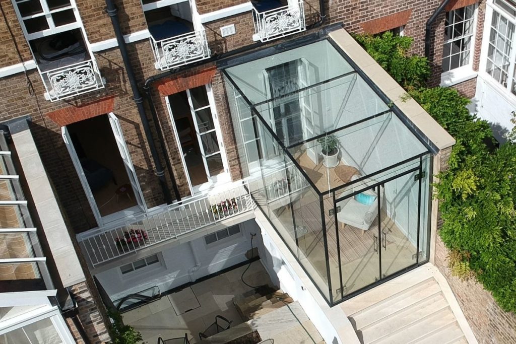 all glass box sunroom extension
