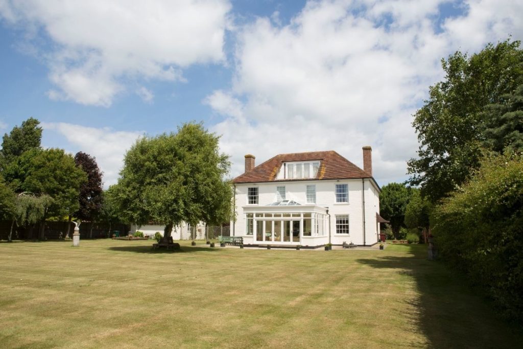 Luxury white timber framed orangery extension, west sussex