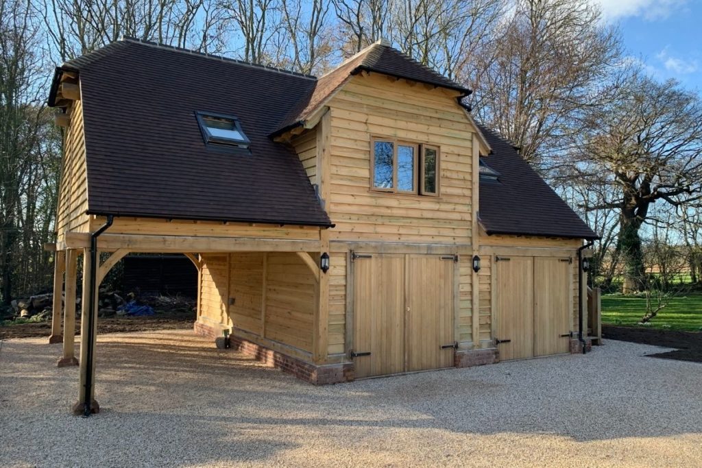 Double oak barn garage with car port and office