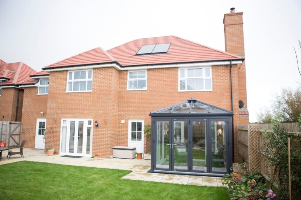 Grey Framed uPVC Conservatory on a large modern new build property