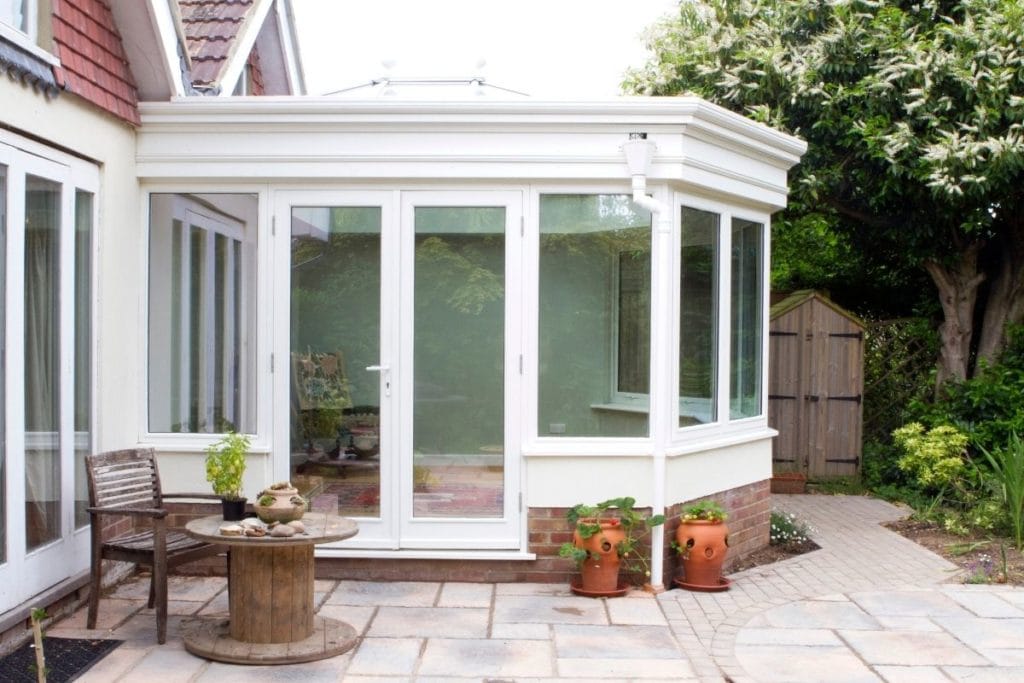 double glass aspect hexagonal orangery