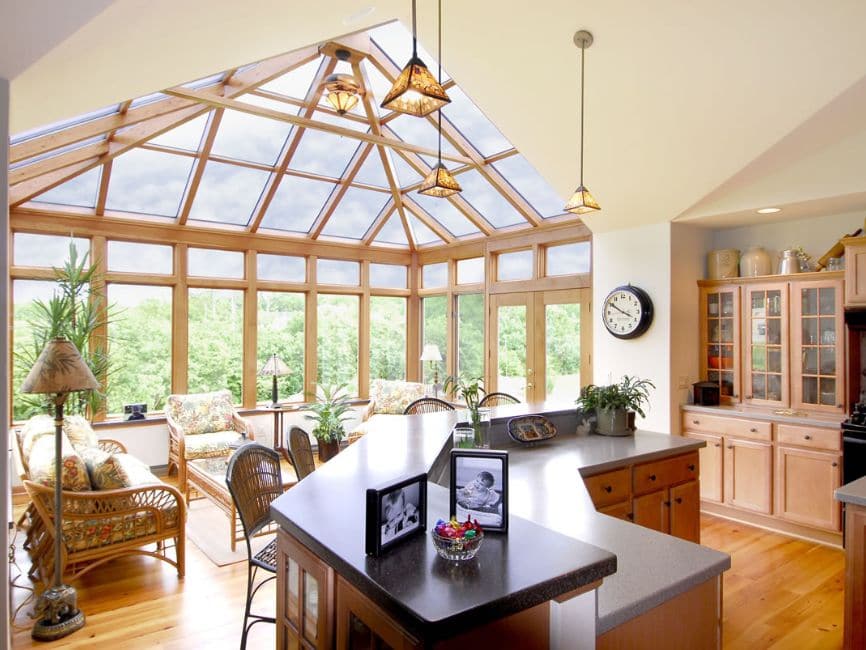 Open plan Four Seasons timber conservatory kitchen-living extension