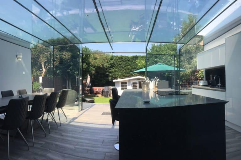 Frameless glass kitchen and dining extension