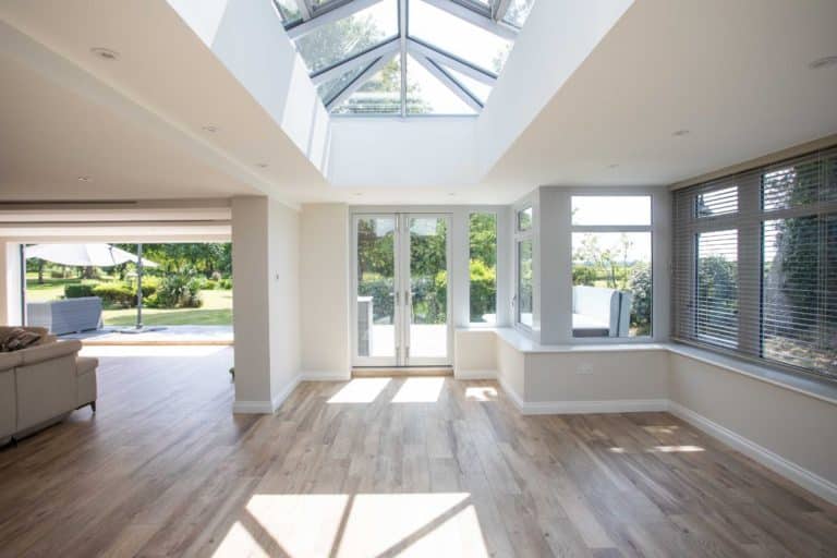 Open plan timber orangery with large lantern roof